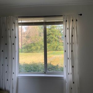 IKEA White Cotton Curtains with Green Embroidered Bee detail
